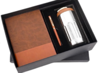 Tan corporate gift set with insulated mug flask, diary and pen